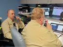 Frank Watervoort, AB0WV (left), and Rand Reynard, W0RDR, at the Douglas County Emergency Operations Center. [Courtesy of Ron Coffee, KD0TRY]